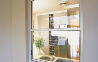 aluminium double hung windows installed in an apartment unit in Bondi Sydney
