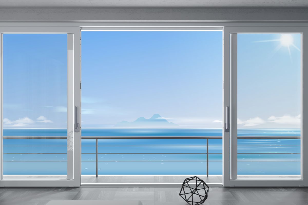 aluminium sliding doors opening up to a sea view