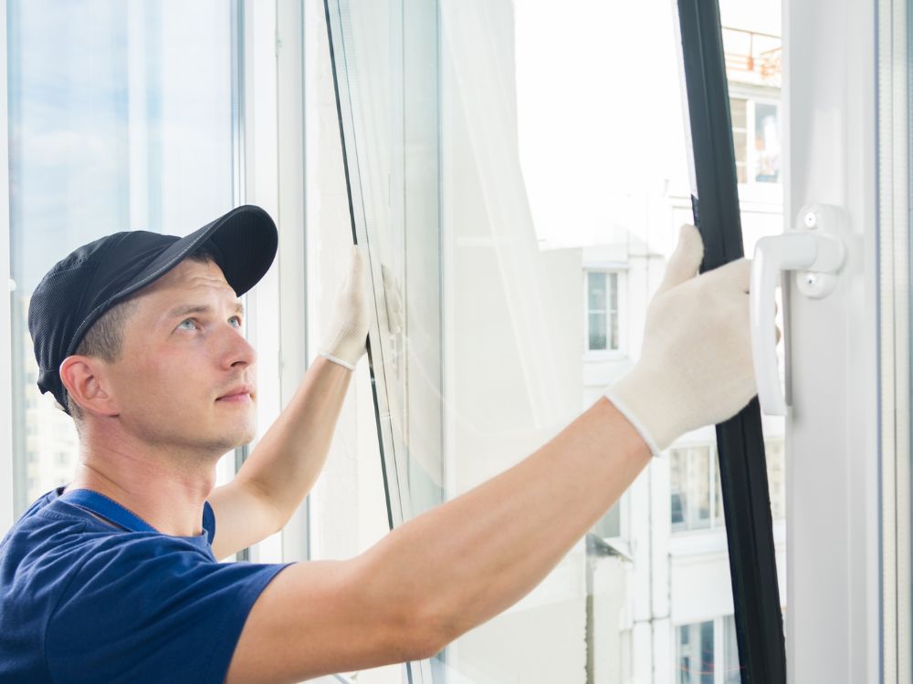 glazier installing aluminiumdouble glazed windows in sydney